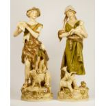 A Royal Dux pair of Shepherd playing the pipes, number 570, and Shepherdess with goats, number