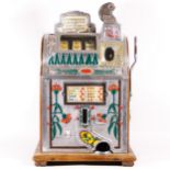 A Mills Poinsettia Revamp slot machine, one arm bandit, c.1932, vertical stack jackpot, restored and