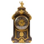 A 19th century French boulle mantel clock, the 14 cm dial with silvered chapter ring, the red