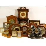 A substantial collection of mechanical and quartz clocks, to include wall clocks, carriage clocks,