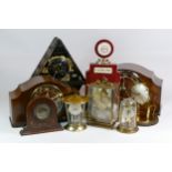 A collection of mid 20th century clocks, to include Dutch wall clocks, mantel clocks and lantern