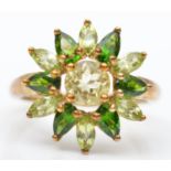 A 9ct gold diopside and yellow gemstone cluster ring, O, 3.3gm