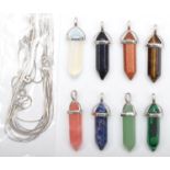 8 silver mounted hardstone pendants, including goldstone and malachite, together with 10 silver