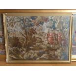 A large gilt framed tapestry depicting a Regency figures in an interior, 161x61cm, together with a