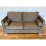 A modern three seater sofa, upholstered in a mink chenille fabric. L178, D88, H83