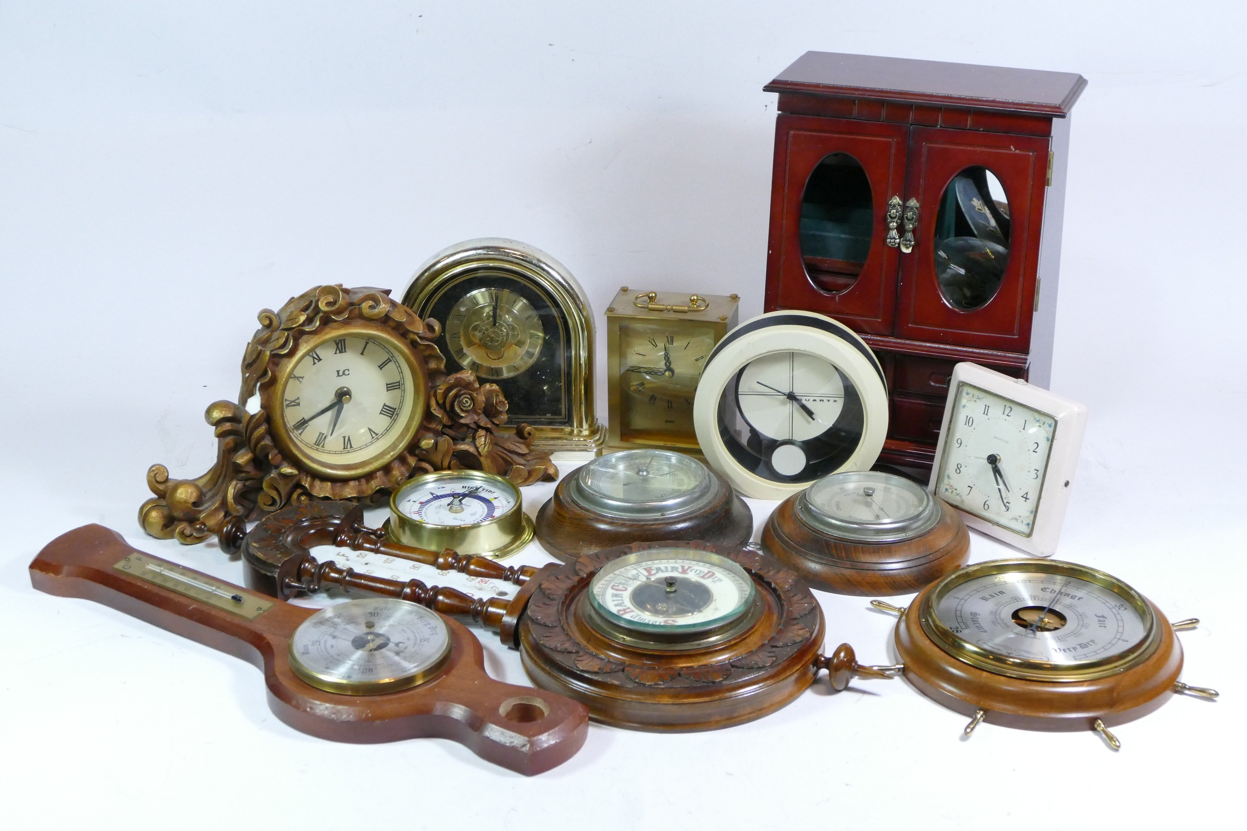 A collection of mid 20th century and later mantel clocks, carriage clocks and barometers, having - Image 2 of 4