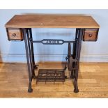 A Jones cast iron treadle sewing machine converted to a table, 84 x 76 x 39cm