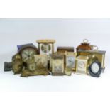 A collection of mid 20th century and later mantel clocks, having manual wind and quartz movements,