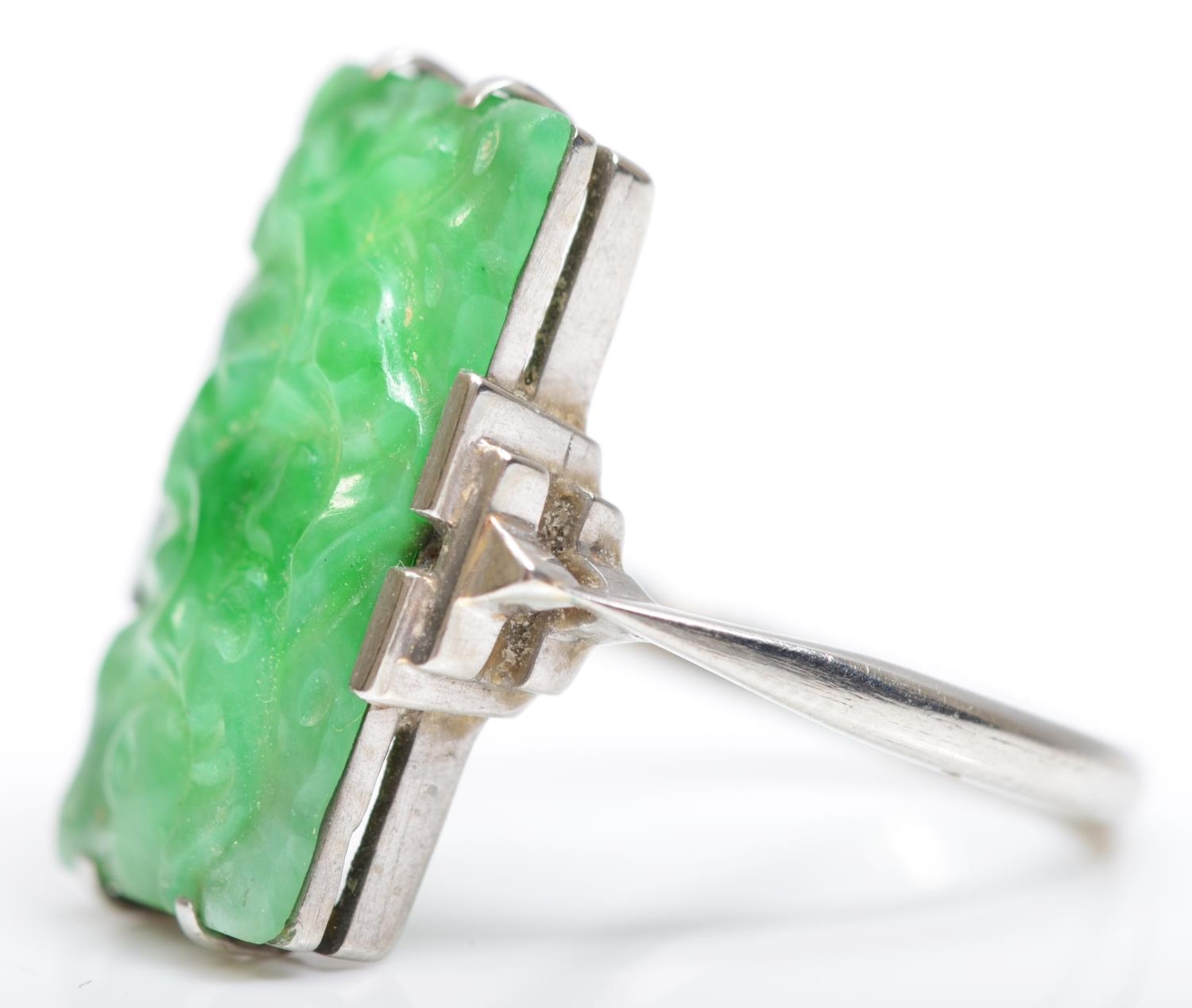 An Art Deco 9ct white gold and carved jadeite panel ring, 19 x 11mm, N, 3.7gm. - Image 2 of 4