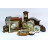 A collection of mid 20th century and later mantel clocks, carriage clocks and barometers, having