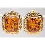 A continental 14k gold and amber pair of ear studs, bearing control marks, 18 x 15cm overall, 5.8gm.
