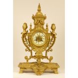 A French ormolu clock, late 19th century in Louis XV style, the enamel dial with blue numerals, bell