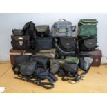 Twenty two camera bags and pouches, from brands such as Olympus, Canon, Lowpro and others,