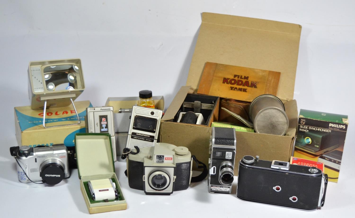 A collection of film, digital and video cameras, to include a Olympus C-740 ultra zoom, with 2gb