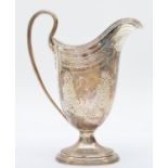 A Victorian silver cream in the Neo Classical taste, by the Barnards, London 1880, with bright cut