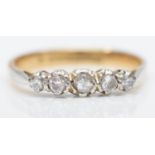 A vintage 9ct gold and brilliant cut diamond five stone ring, O 1/2, 2.1gm