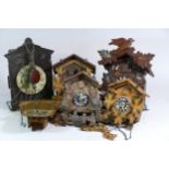 Five Black Forest 30 hour cuckoo clocks, for spares or repair.