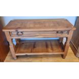 A pine side table with long frieze drawer over a pot shelf, 110 x 76 x 45cm