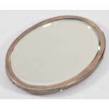 A silver backed mirror, London 1906, lacking handle, 14 x 10.5cm