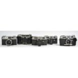 Five rangefinder cameras, to include a Yashica J (717919), a Mamiya Rank (x2) (100302 and 111203), a