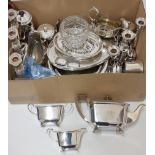 A collection of silver plated wares, to include tea & coffee services, gravy boats, candelabra,