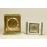 A 1960s Art Deco style Elliott 8 day mantel clock, the veined marble case with chrome bezel and