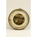 A late 19th century brass wall hanging holosteric barometer and fahrenheit's thermometer. 13cm