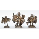 Three silver peddler figures, stamped 925, with loose hung wares, the largest 6cm, 163gm