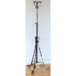 A Victorian wrought iron oil lamp stand, with adjustable column, 117 - 149cm.