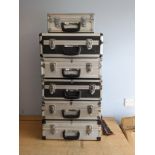 Six metal flight cases, for photography and video equipment, various sizes