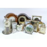 A collection of mid 20th century and later mantel clocks and clock parts, having manual wind and