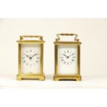 Two mid 20th century French brass carriage clocks, having 8 day movements. 12cm tall (2)