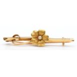 A Victorian 15ct gold and pearl forget me not floral brooch, stamped 15ct, 45mm, 2.9gm