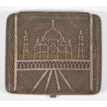 An unmarked silver filigree cigarette case, with mosque decoration, 9.5 x 8 x 1cm, 121gm