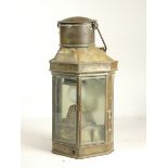 A brass ships lamps, , brass with three glazed sides, compete with burner, stamped Howes & Curley