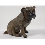 An early 20th century figural 'Striker' table cigarette lighter, in the form of a seated Bulldog,