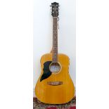 A EKO Ranger 6/LH acoustic guitar (serial No 2009/04/30), cooper strings, rainbow patterned strap,