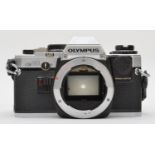 A Olympus OM-10 35mm film camera, body only, working