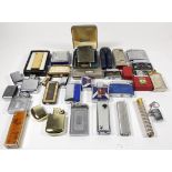 A collection of pocket cigarette lighters, petrol and gas examples, makers to include - Colibri,