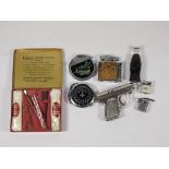 A 1950s Ronson 'Service Outfit' tin with original contents, together with seven 1960s novelty pocket