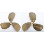 A pair of three bladed brass propellers, both stamped with BWB 861, each stamped with a serial