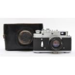 A Zorki 4 35mm film camera, with a Jupiter 50mm f2 lens, cased, working