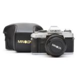 A Minolta X-500 35mm film camera, with a Minolta 50mm f2 lens, case, working, lens requires a