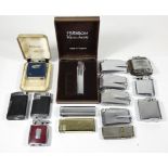 A collection of pocket cigarette lighters, primarily Ronson gas examples.