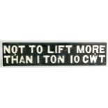 A cast-iron sign "Not To Lift More Than 1 Ton 10 CWT", originally fitted to a station yard goods