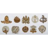 A collection of 10 military cap badges, to include RAF and London Scottish
