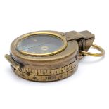 A Pitkin WWI military compass, brass case with a blackened finish, stamped on verso with broad arrow