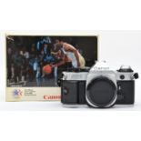 A Canon AE-1 Program 35mm film camera, original 1984 LA Olympics branded box, with manual, working