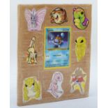 Over 100 Pokemon cards, including holographic cards, together with 10 Digimon cards, presented in