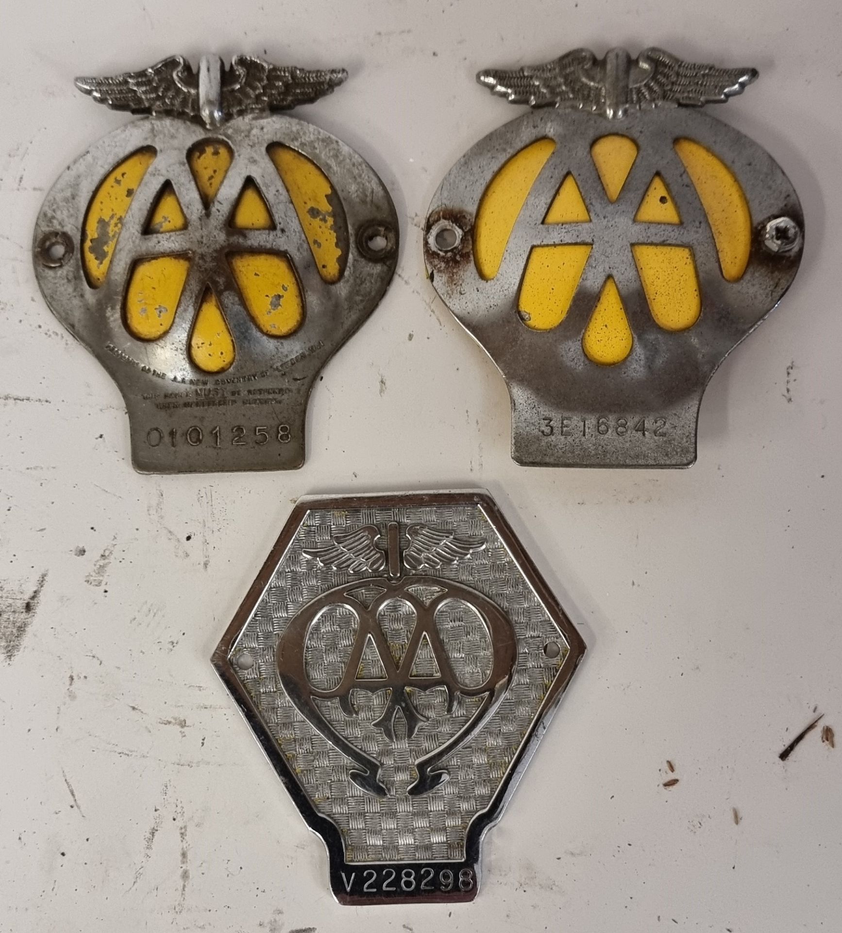 Three AA bumper badges